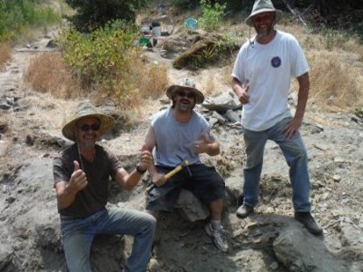 We started calling these guys the “Alpha Team” after they moved some boulders and uncovered the ancient streambed material that is under their feet.